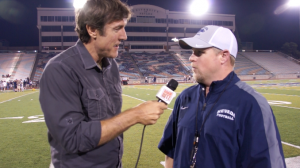 Nevada Wolfpack head football coach Brian Polian talks with Adam Ritz